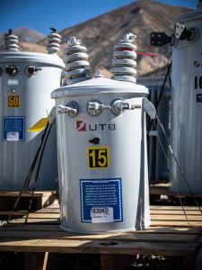 A visual representation of utilities in New Zealand, highlighting energy and water infrastructure against a backdrop of greenery.