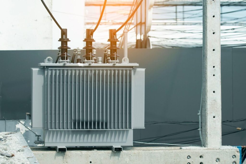 A transformer inside a concrete building displaying its industrial design
